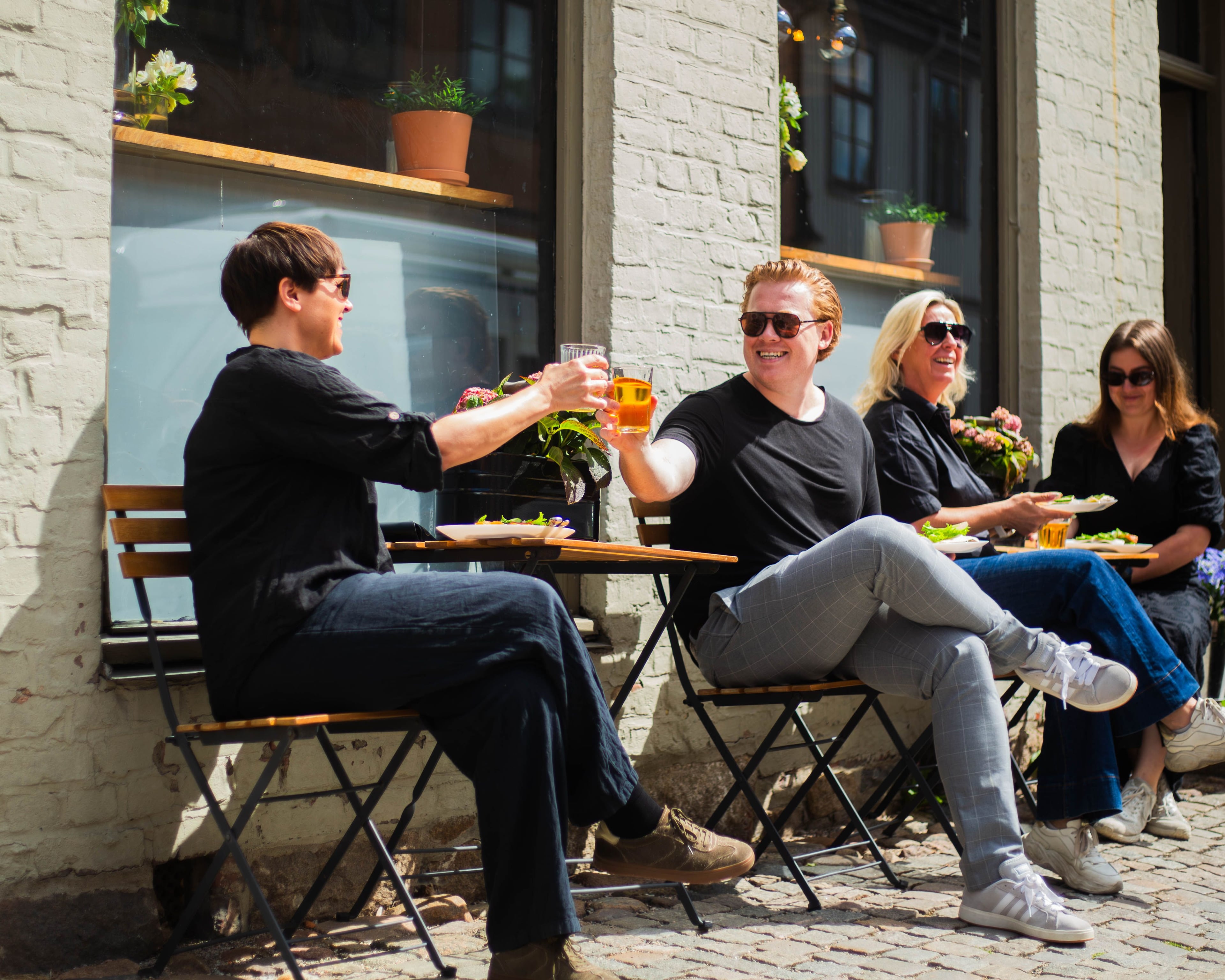Frontkom colleagues outdoors on a summer day